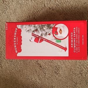 New WondersShop animated  African American climbing santa